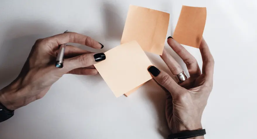 a person holds stickers